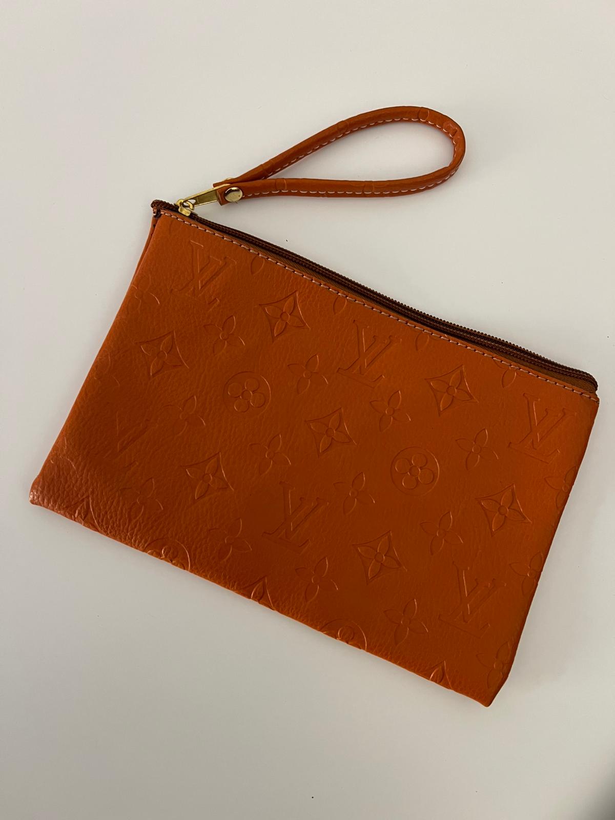 Pochette Louis Vuitton monogram embossed arancio